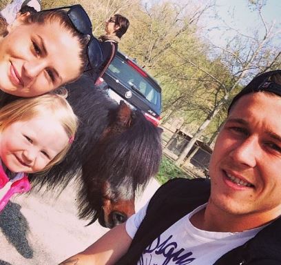 Katarina Kuckova with Juraj Kucka and their daughter in 2014